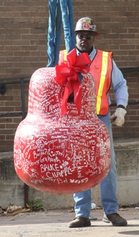 To celebrate - Le Bonheur Associates signed the big red wrecking ball prior to the event
