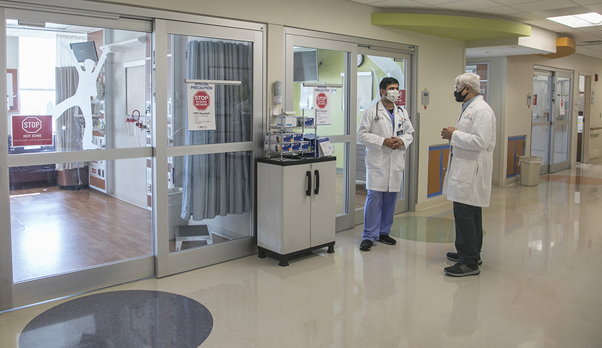 criticalcare physicians speaking in hallway