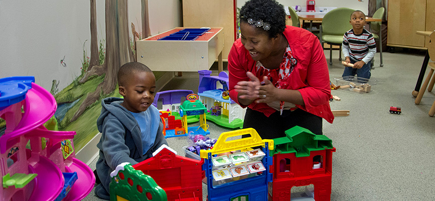 Michelle Williams and Cameron Jeffries in the Forrest Spence Sibling Playroom at Le Bonheur Children's Hospital