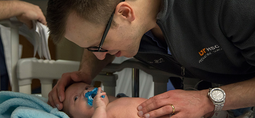 ACS Level I Trauma team member with a patient at Le Bonheur Children's Hospital