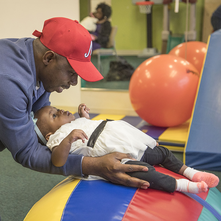 Father with daughter in rehab facility