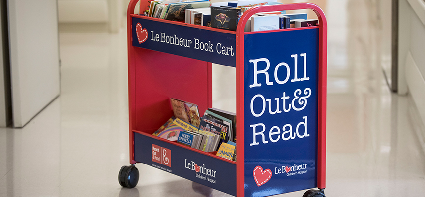 Roll Out and Read volunteer cart at Le Bonheur Children's Hospital